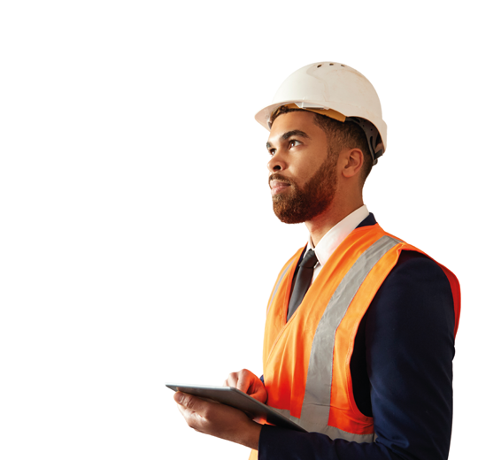 Building inspector in hard hat and high-vis jacket holding digital tablet