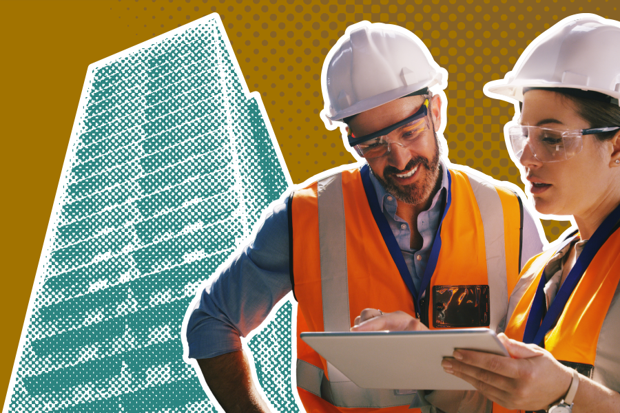 2 building inspectors in hard hats and high vis jackets looking at a digital tablet in front of a teal high-rise building