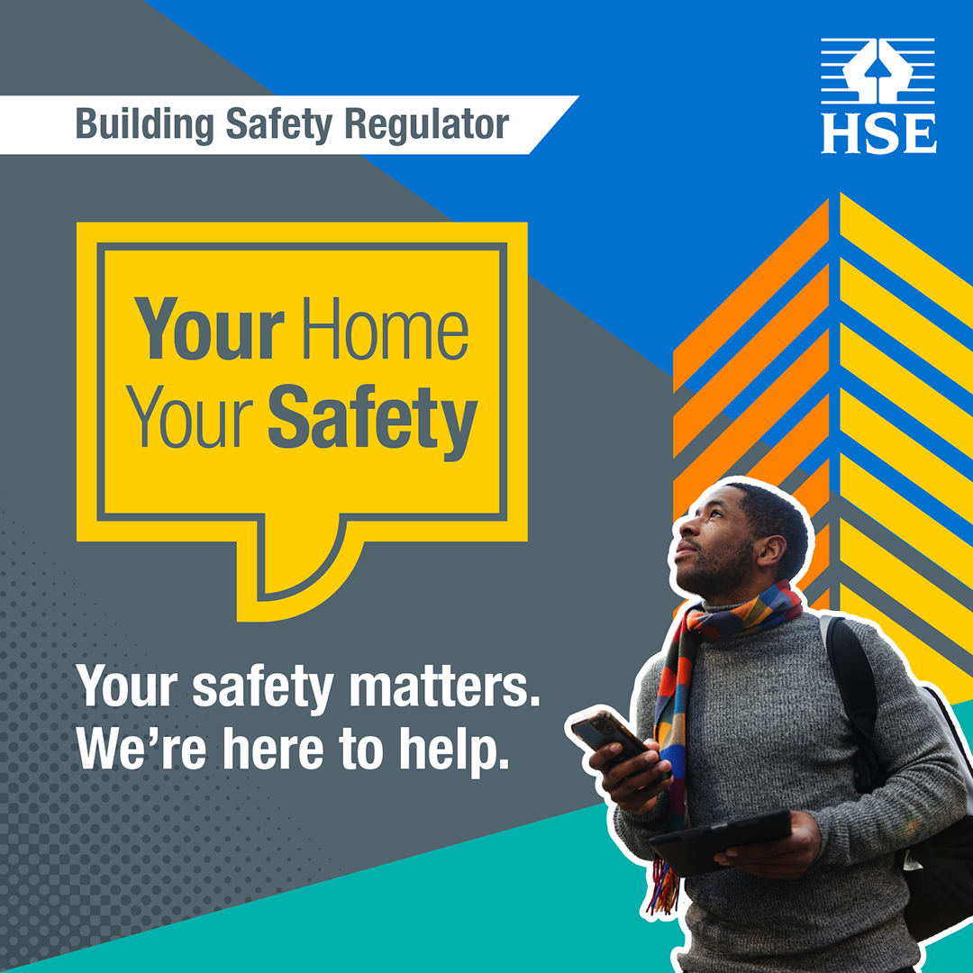 Man in a grey jumper and scarf looking up while holding a mobile phone and tablet. And a yellow speech bubble with Your Home Your Safety written in it.