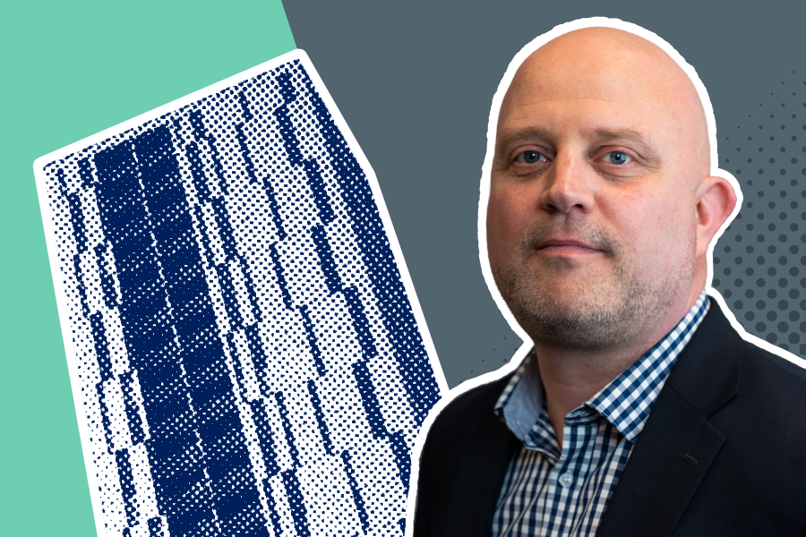 Mark Wilson in front of a blue high-rise building in a halftone pattern