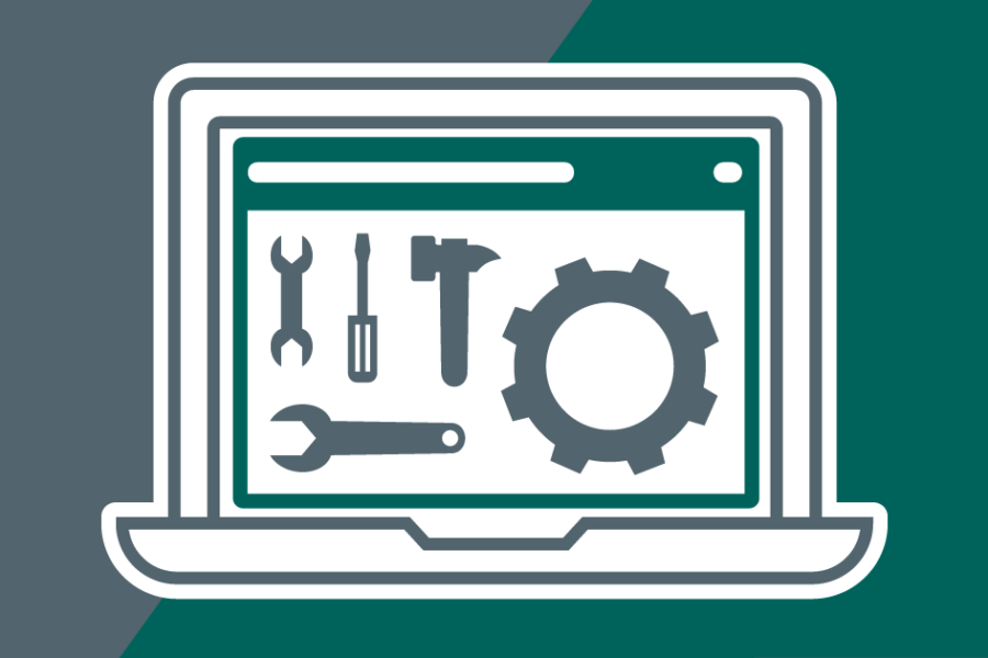 Laptop with a cog and tools on the screen. On a teal and grey background.